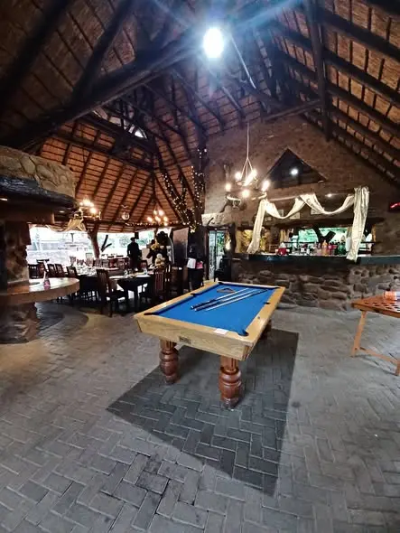The pool table under the thatch
