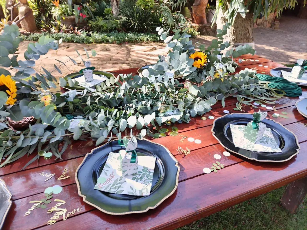 A table set with sunflowers